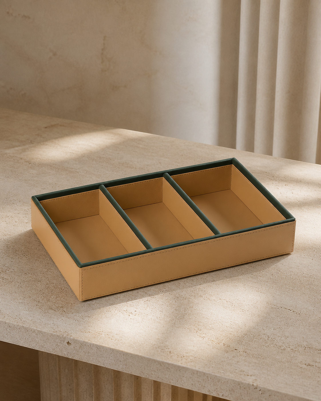 Beige compartment tray with green piping, 3 compartments, grounded editorial view
