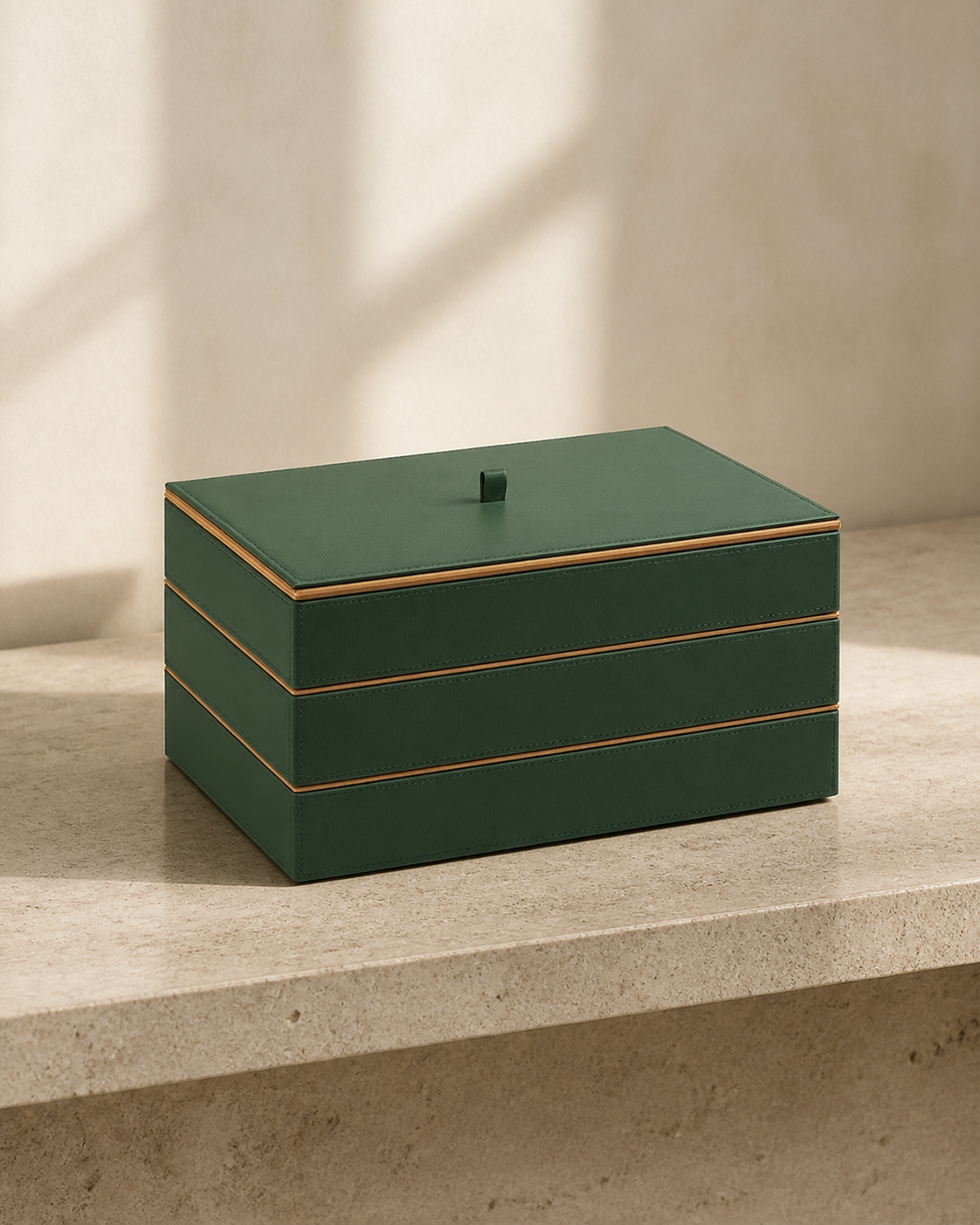 Lidded Stack Tray set of three in Green with beige piping, grounded editorial view