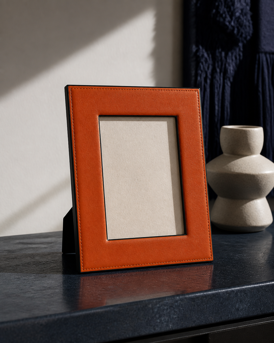 Orange faux-leather tabletop photo frame editorial