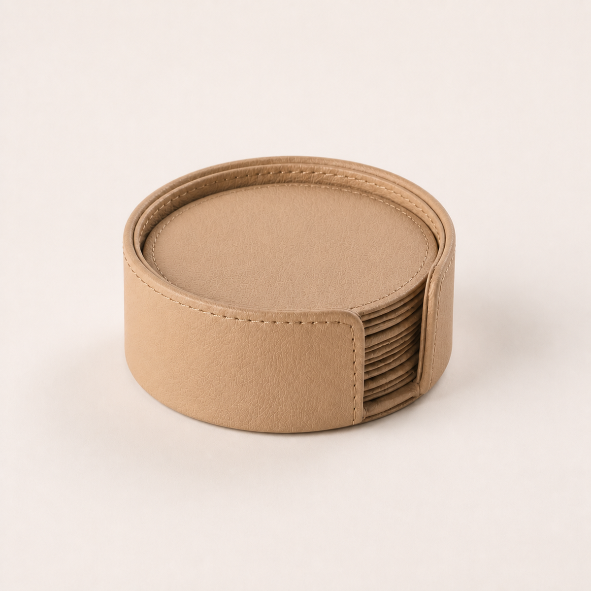 Faux-Leather Coaster Set in Soft Sand — clean studio hero